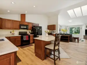 Warm toned LVP flooring through out the whole house.