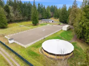 New Lower 9 stall barn, New covered Round Pen, Tru Tex footing and 100x200 lighted arena, Drainage keeps it DRY all winter, RV parking & Hookups, manuer bin, 4 lush fields, Covered shed/parking carport, heated viewing, b room