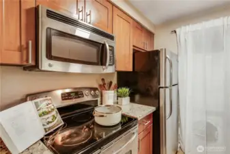 Equipped with stainless steel appliances for a sleek, modern touch.