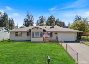 Photo has been edited. Front yard freshly renovated, and grass seed just planted.