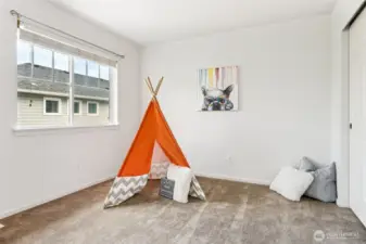 Over-sized guest bedroom with room for anything.