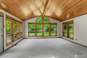 Huge family room with lots of natural light. Also leads to the back deck.