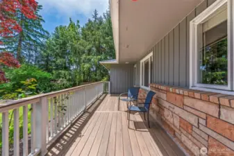 Enjoy the beautiful front yard from the front deck.