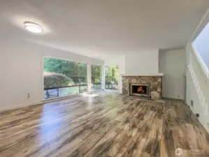 Front room with wood burning fireplace