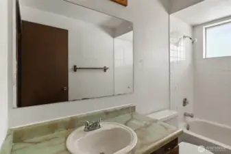 Well-appointed bathroom located close to the bedrooms.