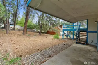 A versatile outdoor space perfect for relaxing or entertaining rain or shine.