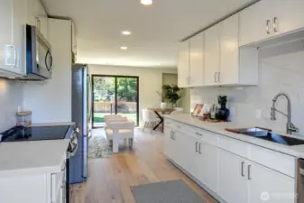 This kitchen has ample counter and cabinet space for all your cooking needs.