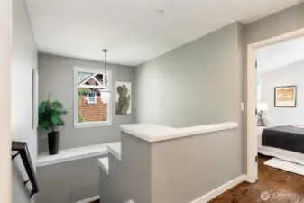 Light-filled, open landing between main and upper floors