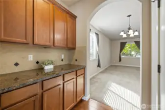 Butler's pantry for extra storage. Perfect for coffee nook or bar.