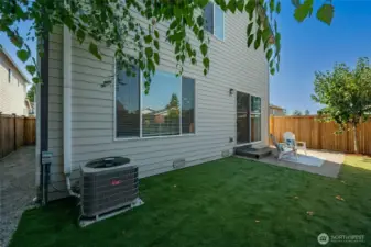 The home has A/C and a low-maintenance turf lawn.