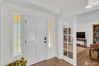 Inviting entry with high ceilings.
