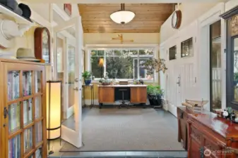 Covered breezeway with heat and slate tile flooring.