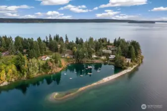 Community cove with moorage for small boats.
