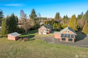 From above, you can really see how comfortably this property lives. The home and detached three-car garage are spaced to give you privacy and flexibility, while the wide circular asphalt driveway makes coming and going easy with plenty of room for guests, toys, or projects. It’s a layout that simply works, whether you want space to spread out, store gear, or create your own workshop.