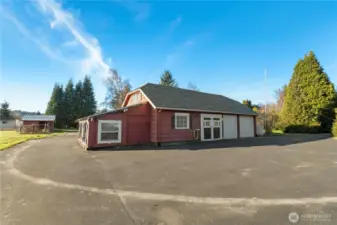 This spacious detached three-car garage is more than just parking. With a 125-amp subpanel, plumbing, a private water heater, and hot and cold faucets, it’s well suited for a workshop, studio, or serious hobbyist. The oversized loft upstairs adds substantial additional space.