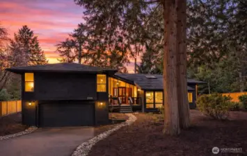 Classic Northwest mid-century architecture surrounded by lush landscaping within the private gates of Sahalee.