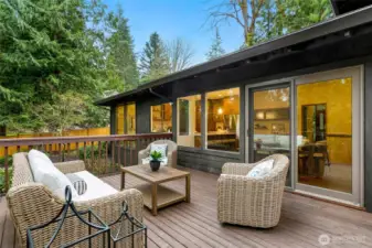 Private outdoor setting ideal for relaxing or entertaining, surrounded by natural surroundings.