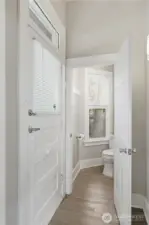 Unit B Front Entry and Half Bathroom.