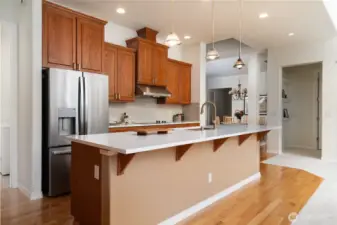 A bakers delight, the long kitchen bar provides ample space for rolling out dough or serving large parties.