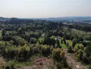 Aerial view looking south. Showing neighbors across Cedar Creek Rd.