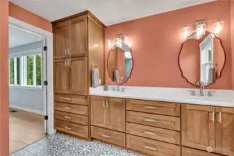 Primary en-suite features plenty of cabinet space, dual sinks...