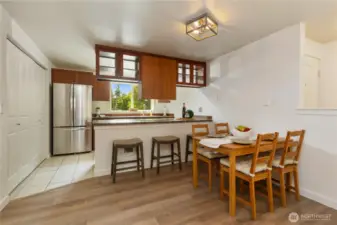 Stainless refrigerator and dishwasher, granite counters and maple cabinets.