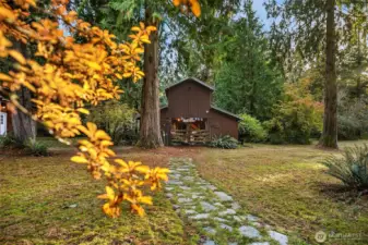 Path to the barn designed to be natural and easy to mow the grass over.
