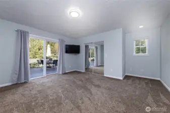 Primary bedroom with a slider to the back patio, and a gorgeous primary bathroom that was JUST finished!