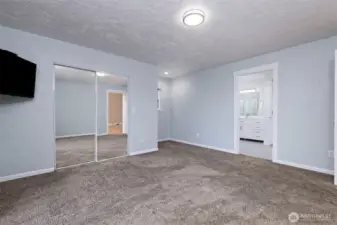 Primary bedroom with 3/4 bathroom that was JUST updated.