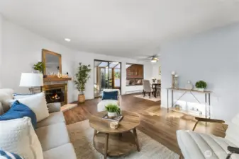 Spacious living and dining room steps out to covered patio