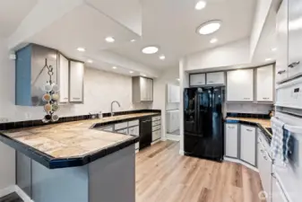 Excellent storage, great counter space, and plenty of light make the kitchen a place you will enjoy cooking in.