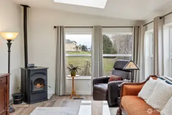 Skylights, ample windows, new drapes, new paint throughout and gorgeous new floors elevates the quality of living.