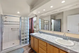 Primary bath is quite large with a spacious shower, separate toilet closet and double sink.