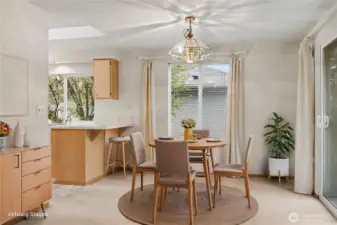 Dining room view from your family room, huge windows again, and patio doors leading to your peaceful backyard. ***Virtually Staged***