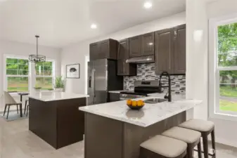 Beautiful island with tiled backsplash and solid stone counter tops