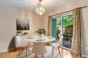 Dining Room area leading out onto private patio. Home is virtually staged