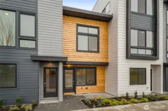 Welcome to Ivy North – a fresh take on Seattle living! Modern architecture, clean lines, and warm wood tones set the tone for this stylish new community right across from Crown Hill Park.