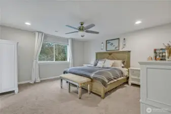 Primary suite with a view of the green space.
