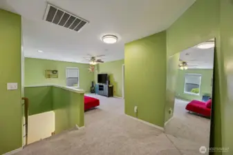 Upstairs opens to bonus loft.