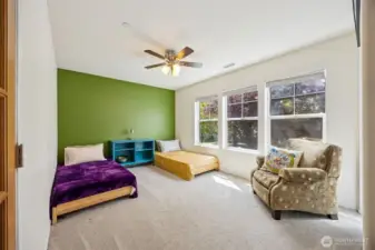 Bedroom 1 with ceiling fan.