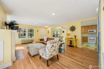 Living room features canned lighting, plus a cozy gas fireplace.
