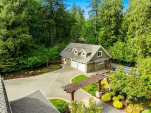 2 Bay SHOP w/ 1/2 Bath, fully insulated and heated w/ golfcart garage.