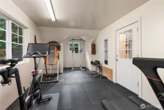 Upper Level Gym area in SHOP, room to the right is storage/ flex space.