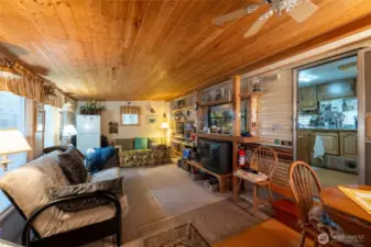 Partially carpeted side room.