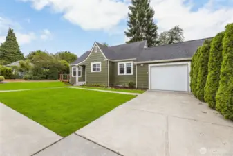 One story home with large driveway, one-car garage and lots of off-street parking