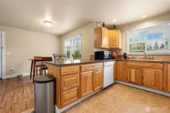 Kitchen opens to dining