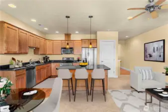 Open-concept kitchen with breakfast bar, perfect for casual dining or entertaining