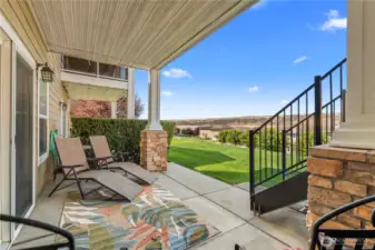 Covered outdoor living space with expansive views - perfect for lounging or dining