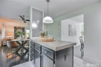 Island with concrete slab countertops