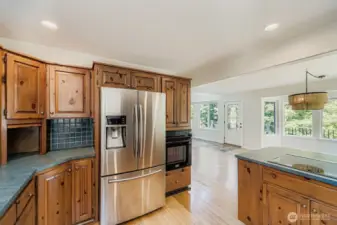 Open concept kitchen with stainless steel appliances